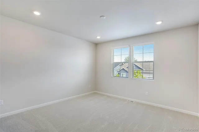 an empty room with an entryway
