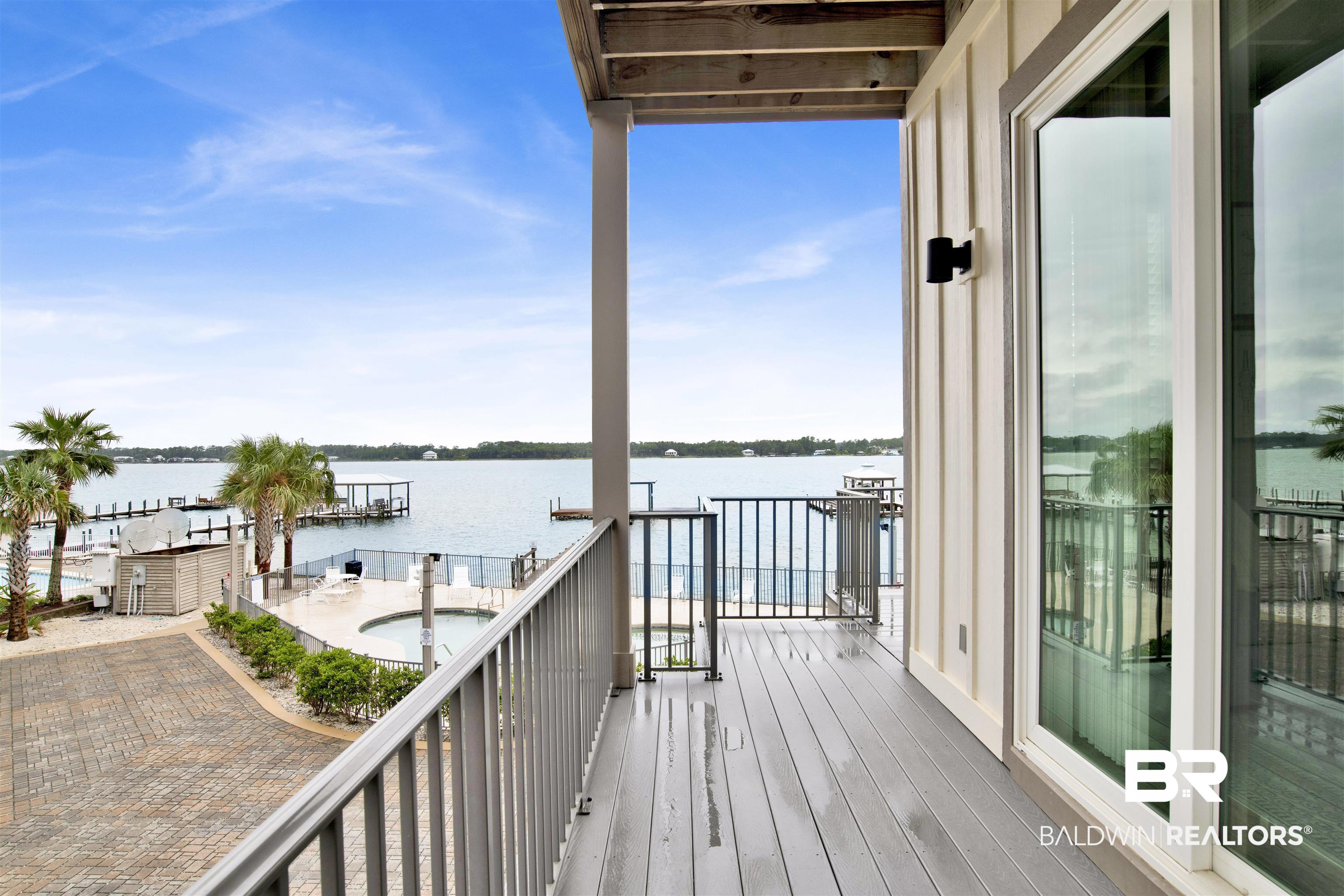 1932 West Beach Boulevard, Unit R Gulf Shores, AL 36542 - Photo 26 of 29 Bedroom 2 Balcony
