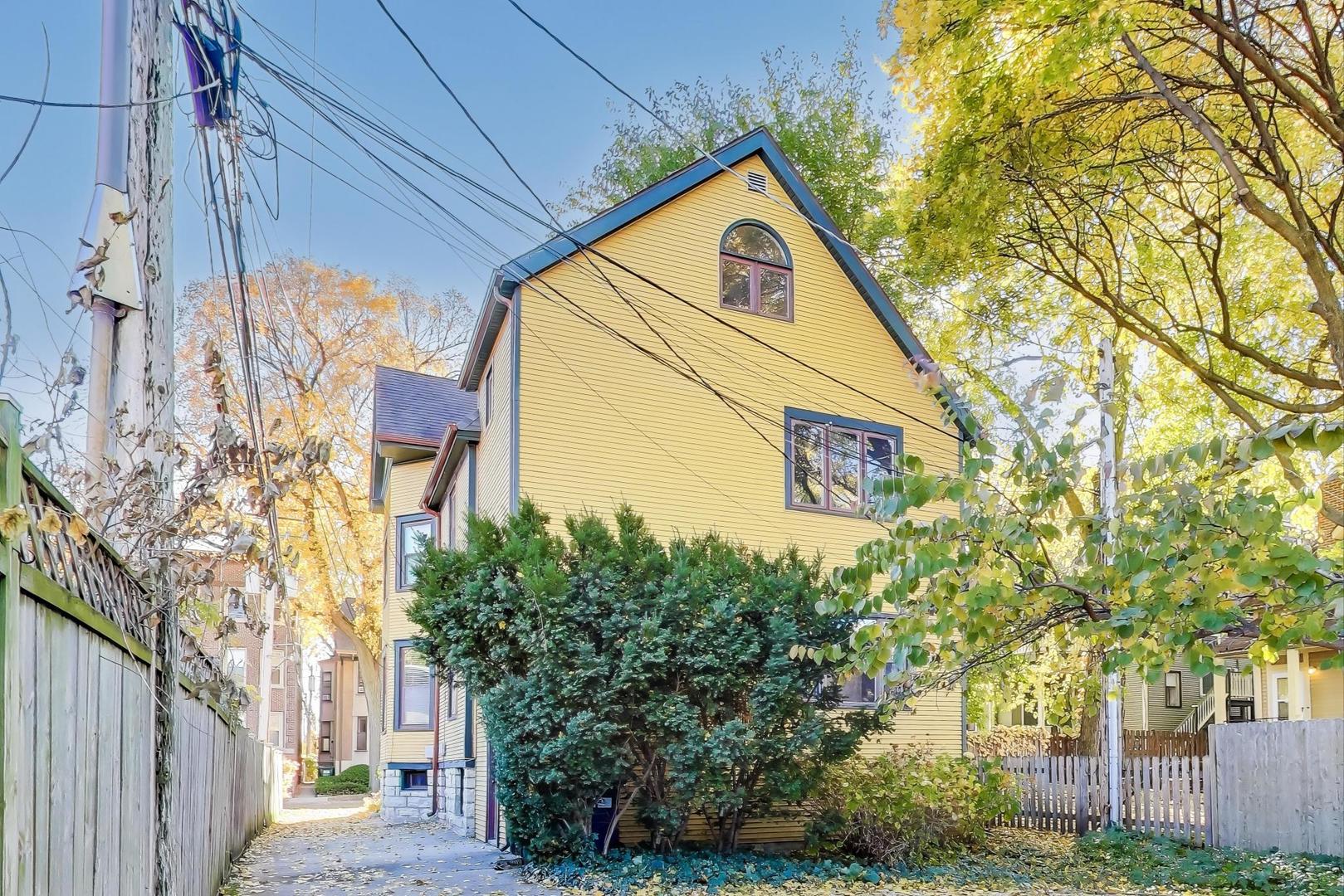 916 Pleasant Street, Unit 1 Oak Park, IL 60302 - Photo 17 of 23 a view of a street with a building in the background