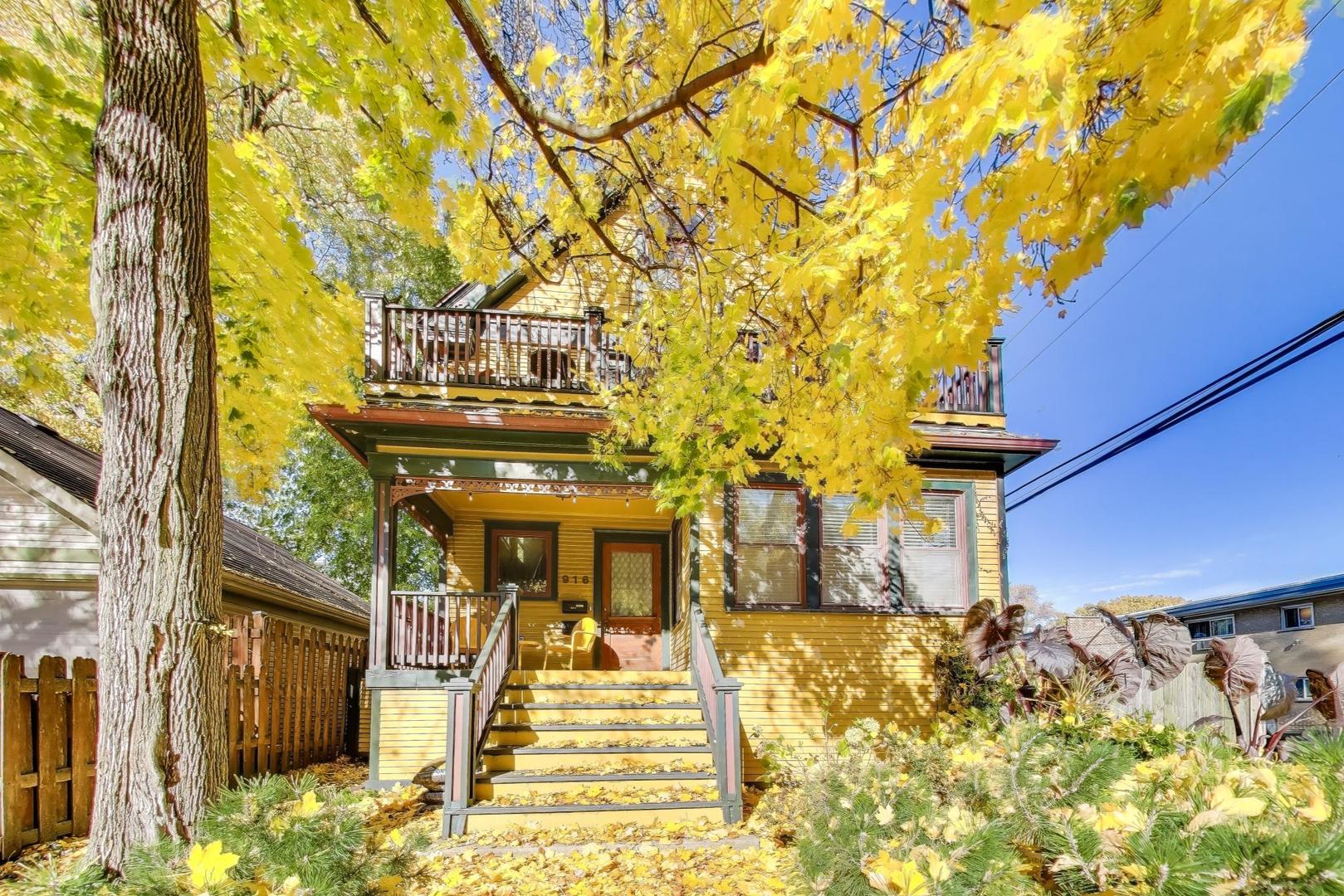 916 Pleasant Street, Unit 1 Oak Park, IL 60302 - Photo 2 of 23 a front view of a building with a yard