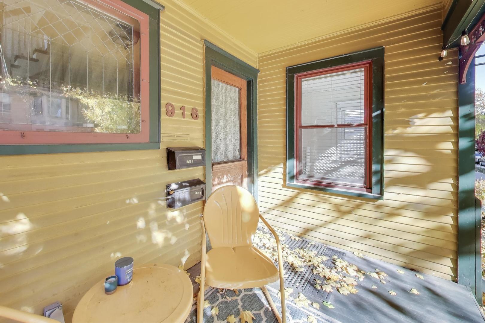916 Pleasant Street, Unit 1 Oak Park, IL 60302 - Photo 4 of 23 a bathroom with a tub sink and mirror
