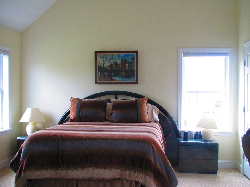 515 Oakham Road Barre, MA 01005 - Photo 17 of 29 a bedroom with a bed and a window