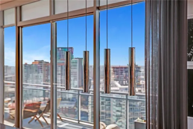 a bathroom with a double vanity sink toilet and shower