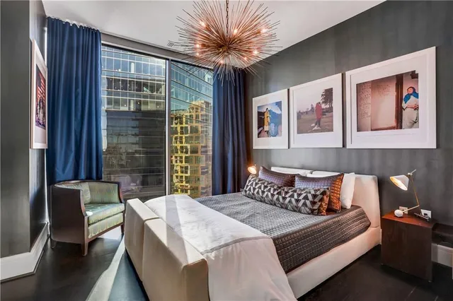 a picture of a bench in front of a gate