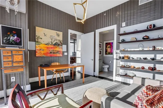 an open kitchen with a table and chairs