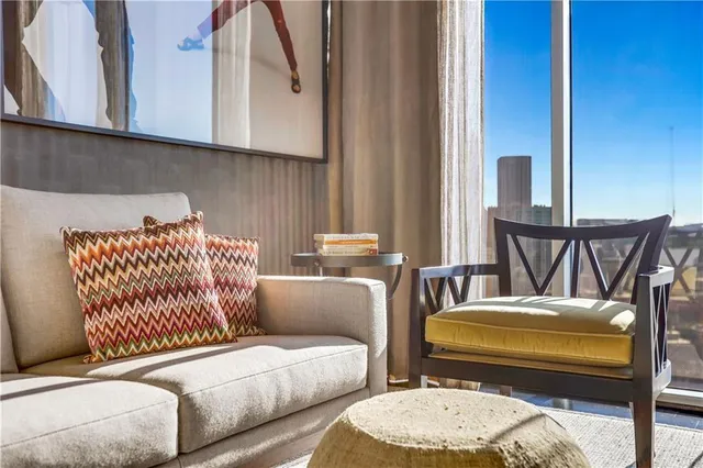 a kitchen with stainless steel appliances kitchen island granite countertop a sink and cabinets