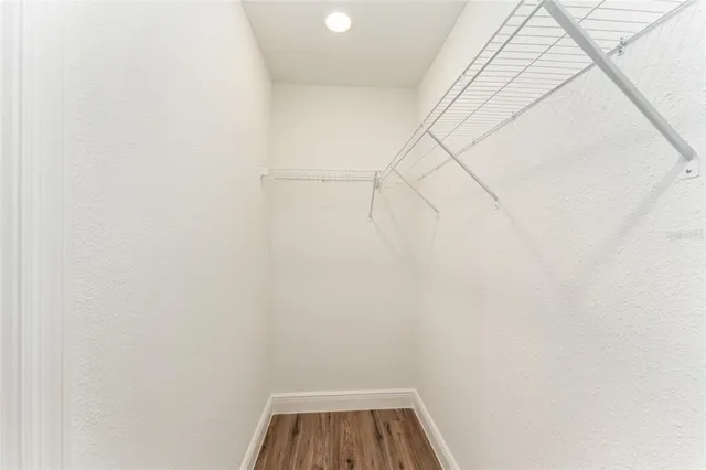 a view of a room with racks on the wall