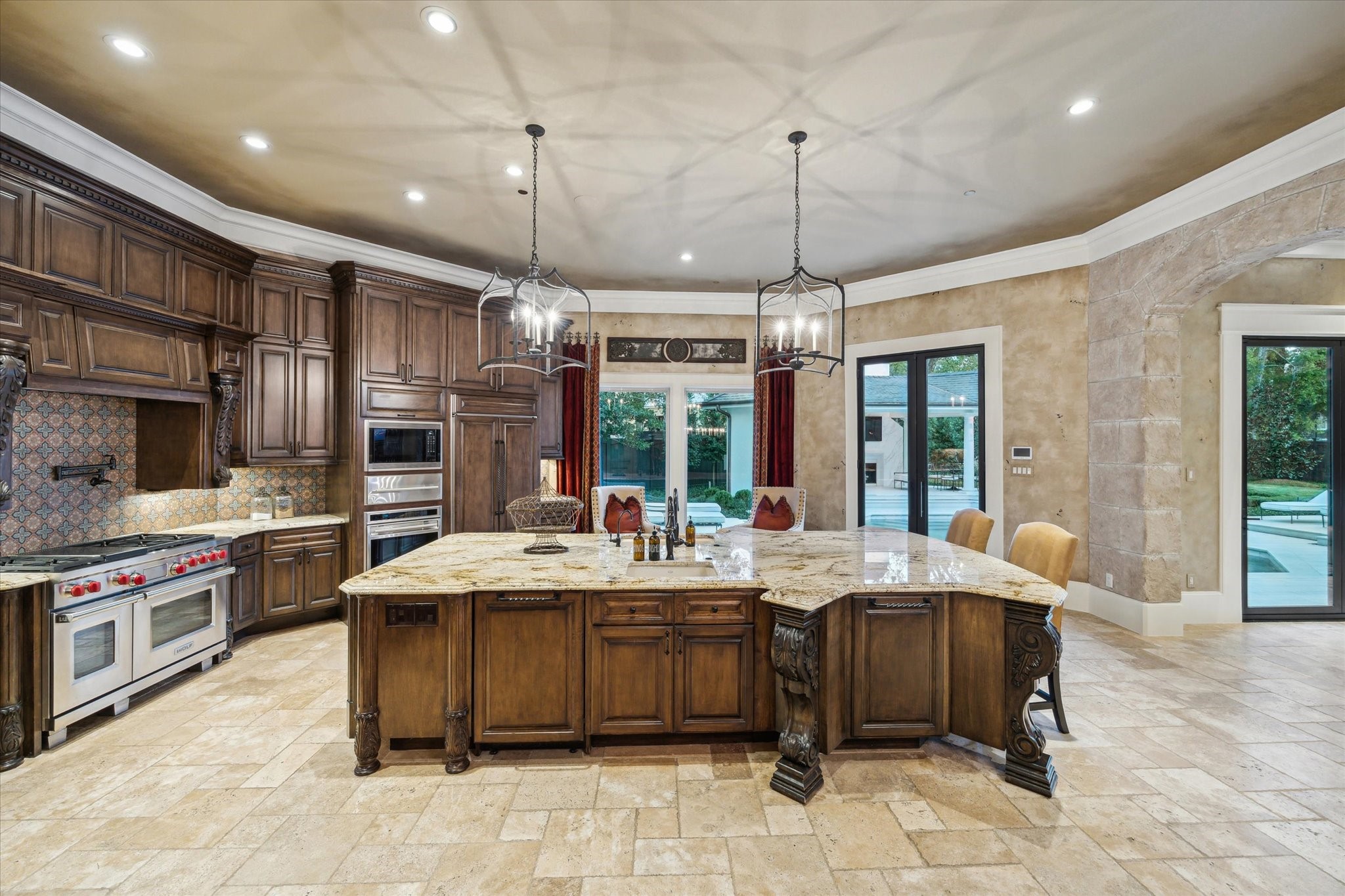 11095 Memorial Drive Houston, TX 77024 - Photo 12 of 48 a large kitchen with a table and chairs