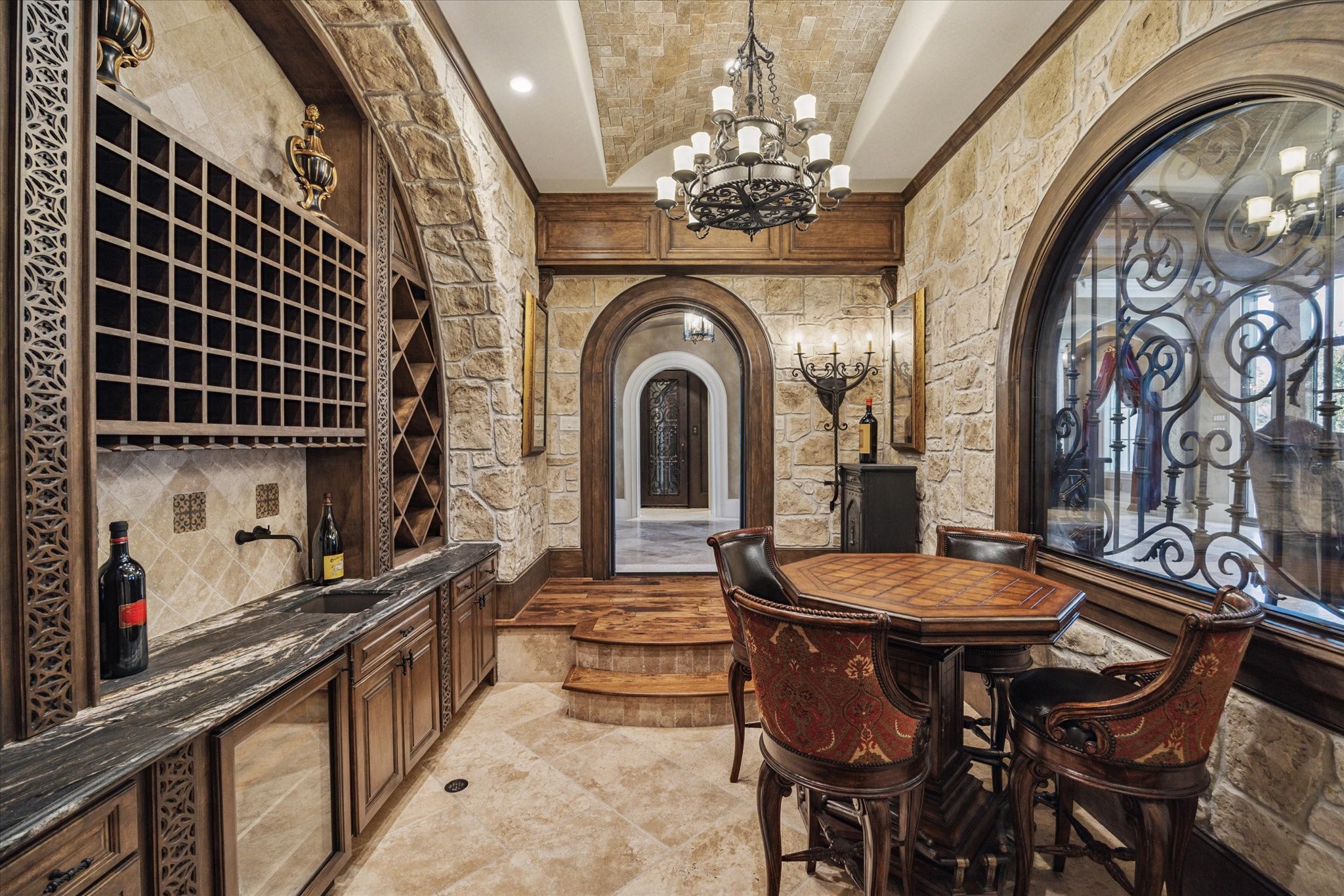 11095 Memorial Drive Houston, TX 77024 - Photo 14 of 48 a view of a dining room with furniture and chandelier