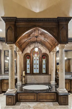 a view of a dining room with furniture and chandelier