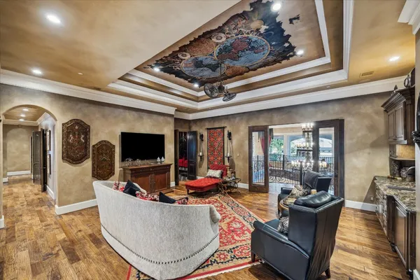 a bedroom with furniture and a bathtub