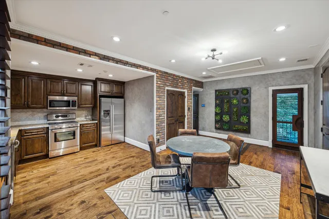 a bedroom with bed and a window