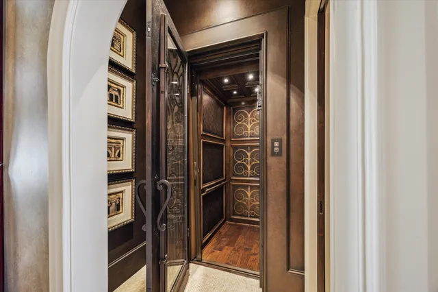 a view of a house with a swimming pool and a porch