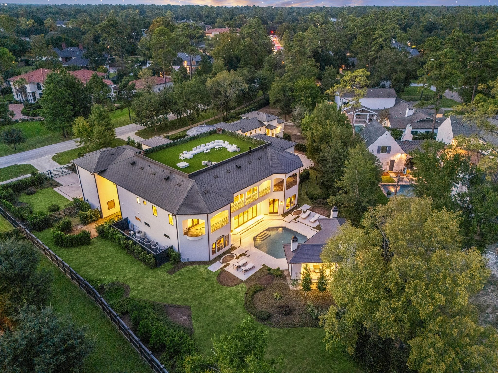 11095 Memorial Drive Houston, TX 77024 - Photo 45 of 48 an aerial view of a house with a garden and swimming pool