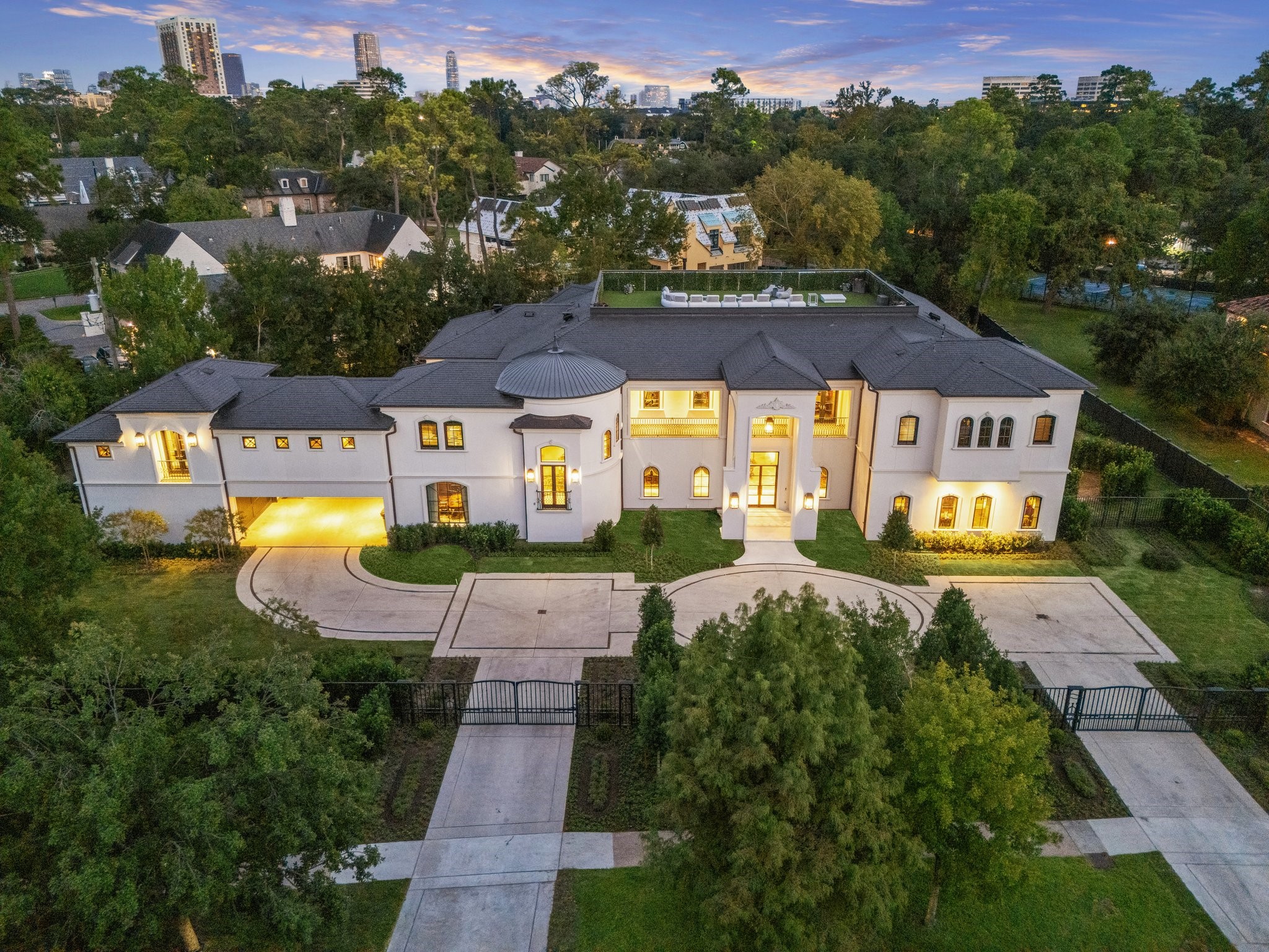 11095 Memorial Drive Houston, TX 77024 - Photo 46 of 48 an aerial view of a house with a garden house swimming pool and outdoor seating