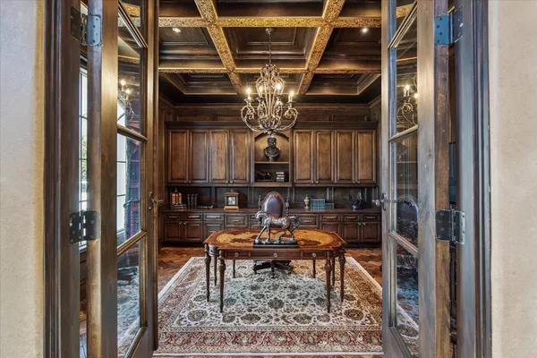 a view of hall way with furniture