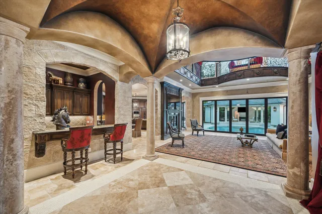 a view of a cafe with sitting area