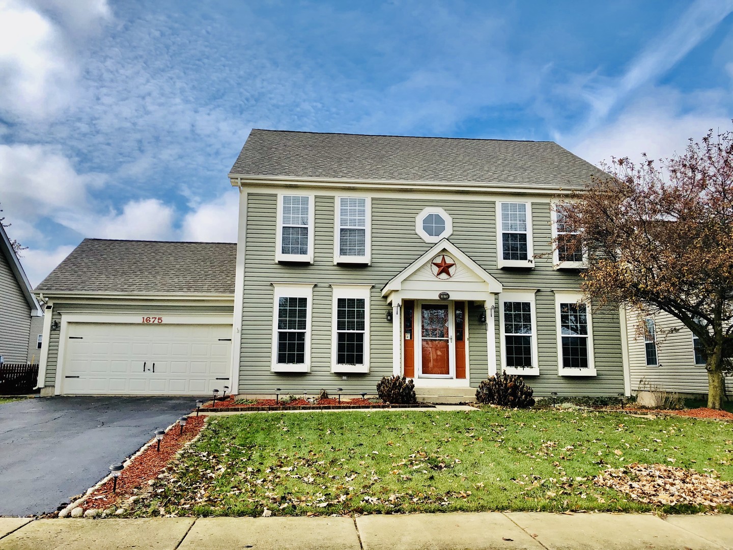 1675 Kautz Road Aurora, IL 60504 - Photo 1 of 57 front view of a house with a yard