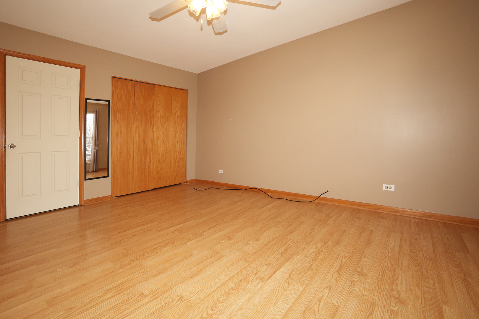 1675 Kautz Road Aurora, IL 60504 - Photo 19 of 57 an empty room with a empty space and a ceiling fan