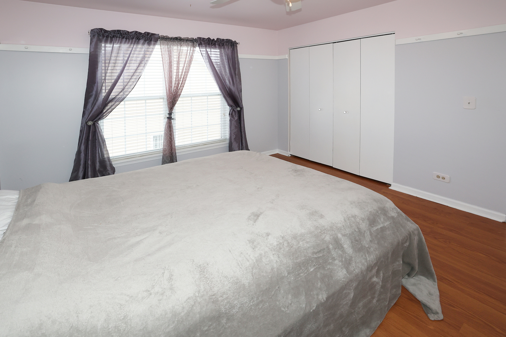 1675 Kautz Road Aurora, IL 60504 - Photo 21 of 57 a large white bed sitting in a room next to a window