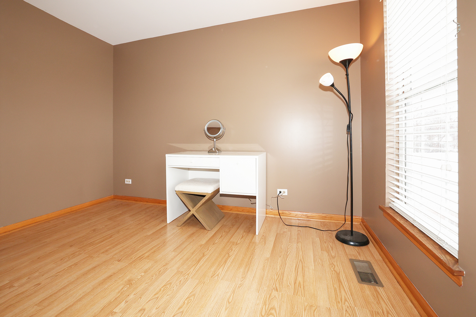 1675 Kautz Road Aurora, IL 60504 - Photo 28 of 57 an empty room with wooden floor and a window