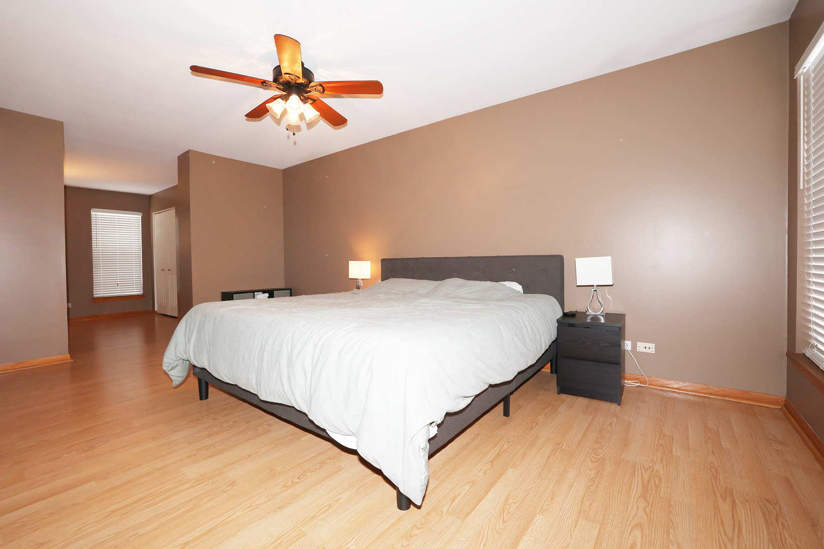 1675 Kautz Road Aurora, IL 60504 - Photo 30 of 57 a bedroom with a bed and a ceiling fan