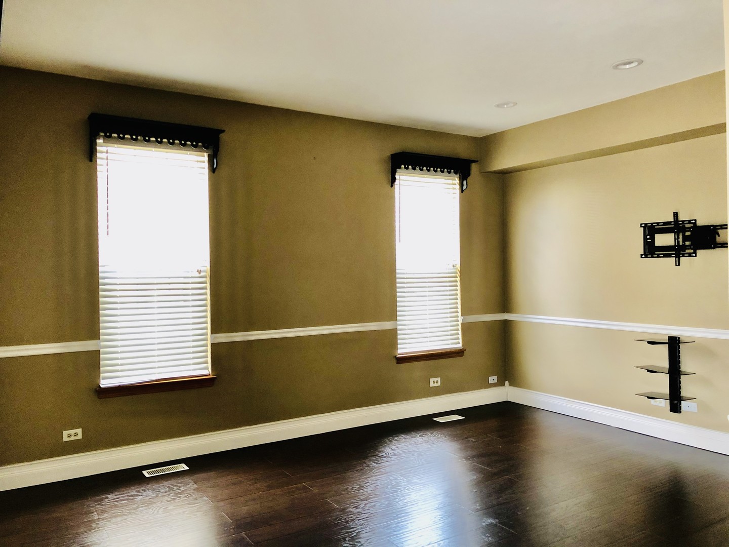 1675 Kautz Road Aurora, IL 60504 - Photo 7 of 57 a view of an empty room with a window and wooden floor