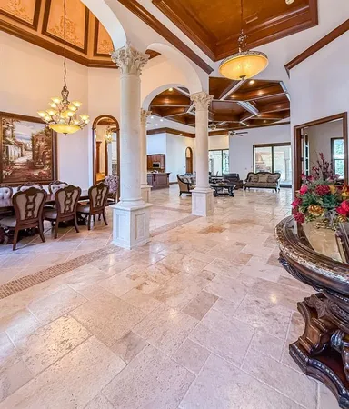 a kitchen with stainless steel appliances granite countertop a stove and cabinets