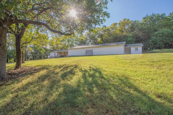 a view of an outdoor space and a yard