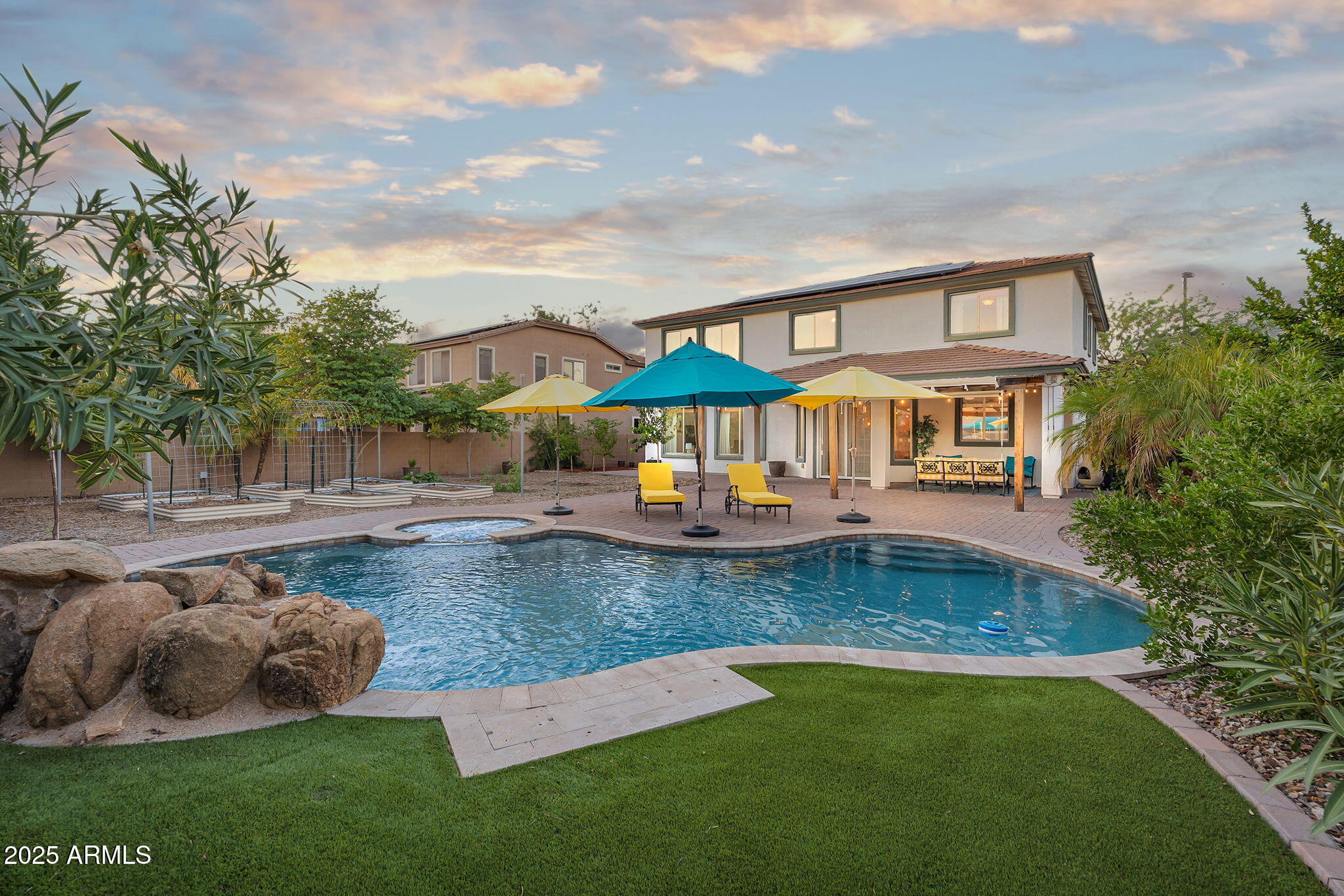 3363 East Blue Ridge Way Gilbert, AZ 85298 - Photo 3 of 34 a view of a house with swimming pool and sitting area