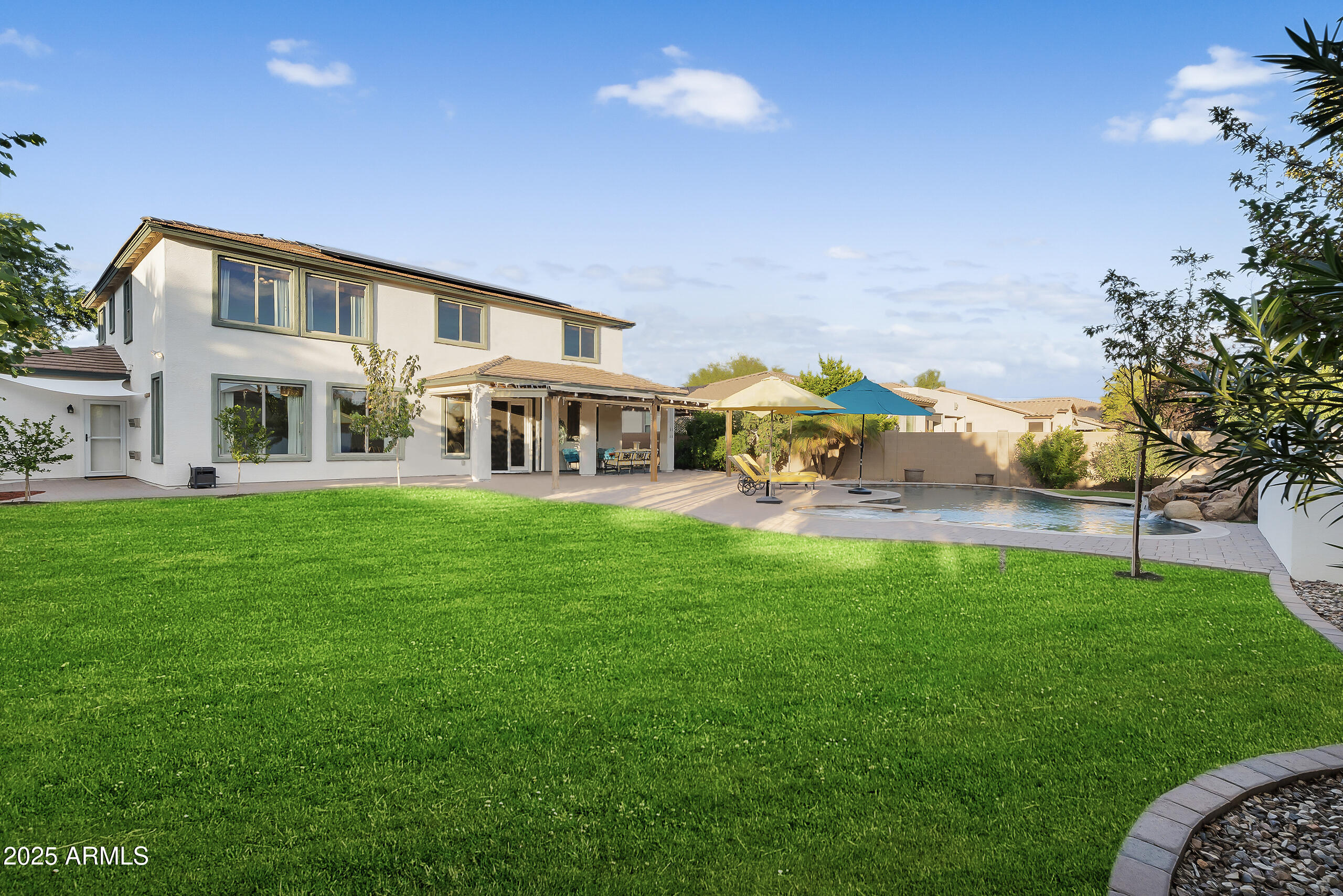 3363 East Blue Ridge Way Gilbert, AZ 85298 - Photo 5 of 34 a view of a house with a big yard