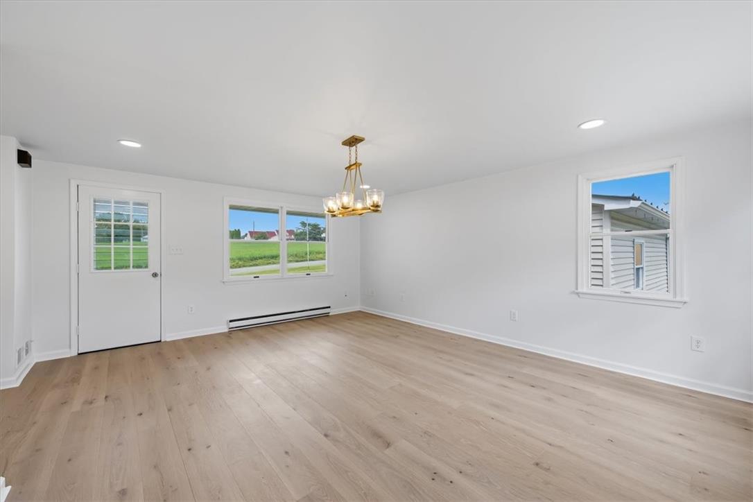 2412 Clearview Road Coplay, PA 18037 - Photo 30 of 53 Hardwood floors and a classic chandelier define this versatile dining area.