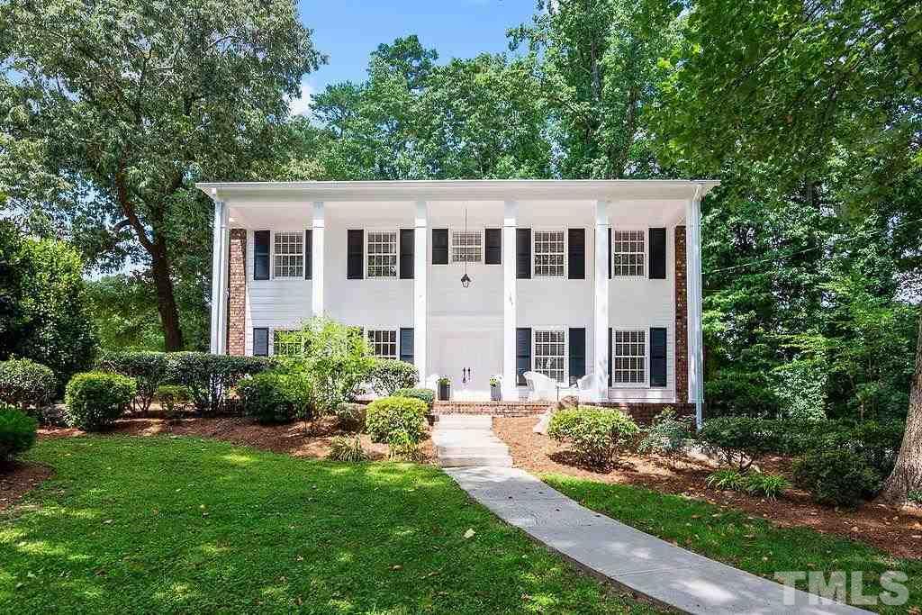 4408 Pamlico Drive Raleigh, NC 27609 - Photo 16 of 20 a view of a house with garden and yard