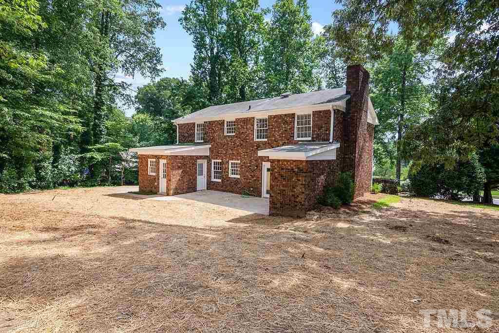 4408 Pamlico Drive Raleigh, NC 27609 - Photo 19 of 20 a front view of a house with a garden