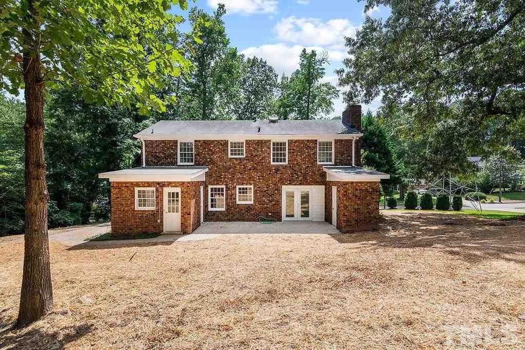 4408 Pamlico Drive Raleigh, NC 27609 - Photo 20 of 20 a front view of a house with a yard and garage