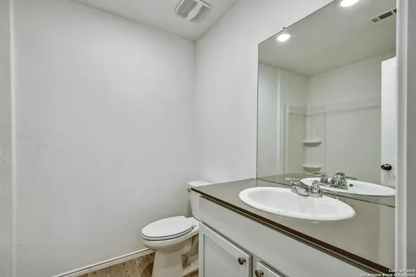 a bathroom with a sink and a toilet