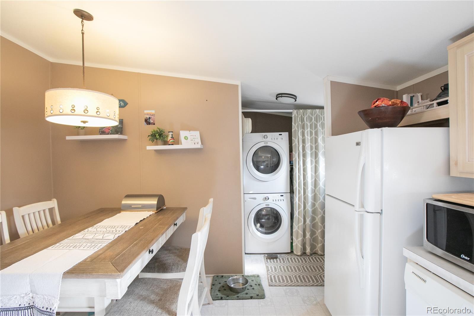 143 Sombrero Road Hartsel, CO 80449 - Photo 8 of 25 a view of a kitchen with washer and dryer