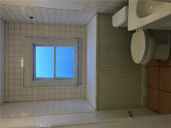 a bathroom with a sink a vanity and a mirror