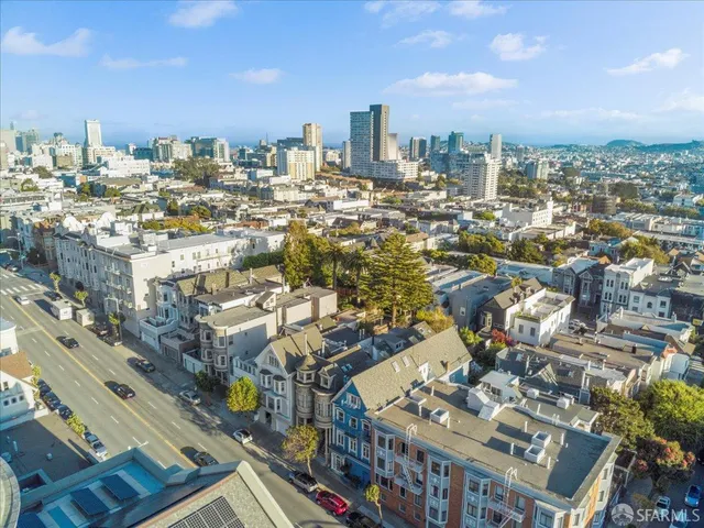 a view of a city with tall buildings