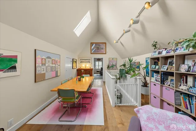 a spacious bedroom with a bed and a couch