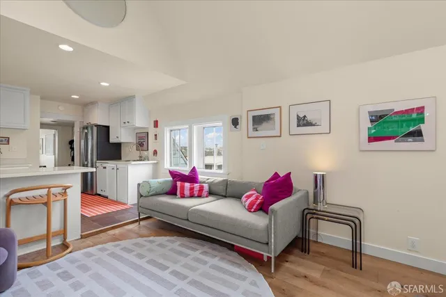 a kitchen with cabinets a sink and appliances