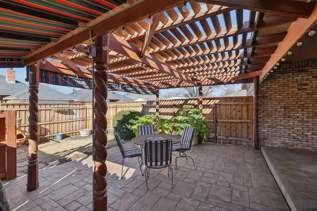 a view of a porch with furniture