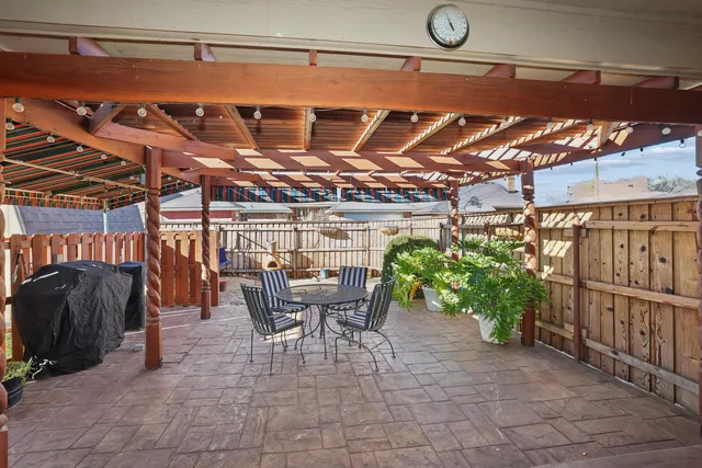 a view of a chairs and tables in patio
