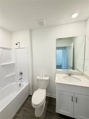 a view of a kitchen with a sink and dishwasher