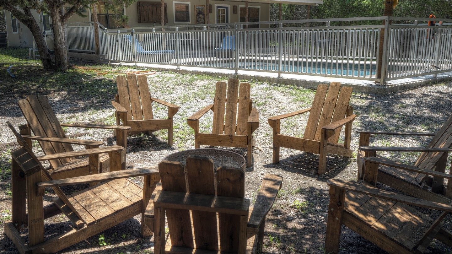170 Cedar Lane Concan, TX 78838 - Photo 18 of 18 a view of backyard with wooden fence