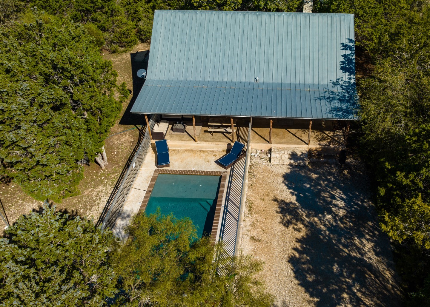 170 Cedar Lane Concan, TX 78838 - Photo 2 of 18 an aerial view of a house with a yard