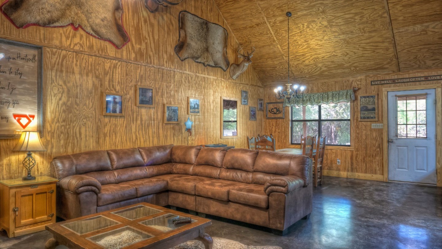 170 Cedar Lane Concan, TX 78838 - Photo 7 of 18 a living room with furniture and a wooden floor