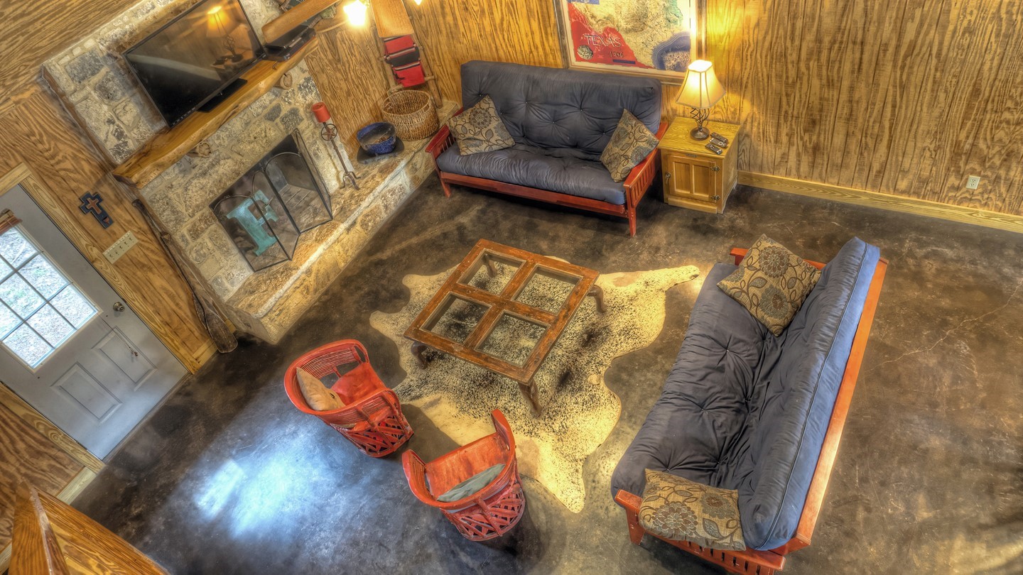 170 Cedar Lane Concan, TX 78838 - Photo 8 of 18 a living room with furniture and a rug