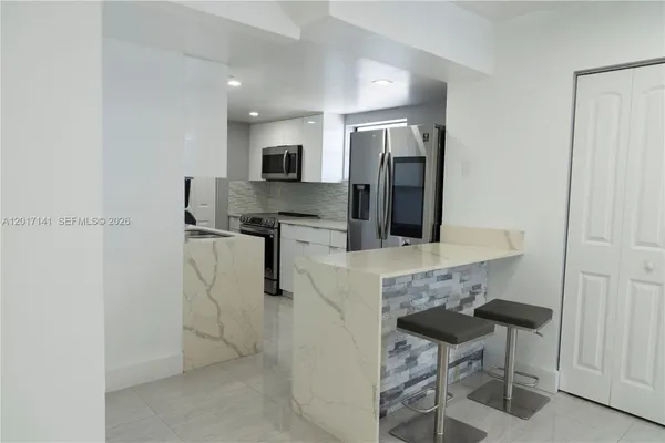 $311,999 | 13850 Southwest 62nd Street, Unit 303, Miami, FL 33183