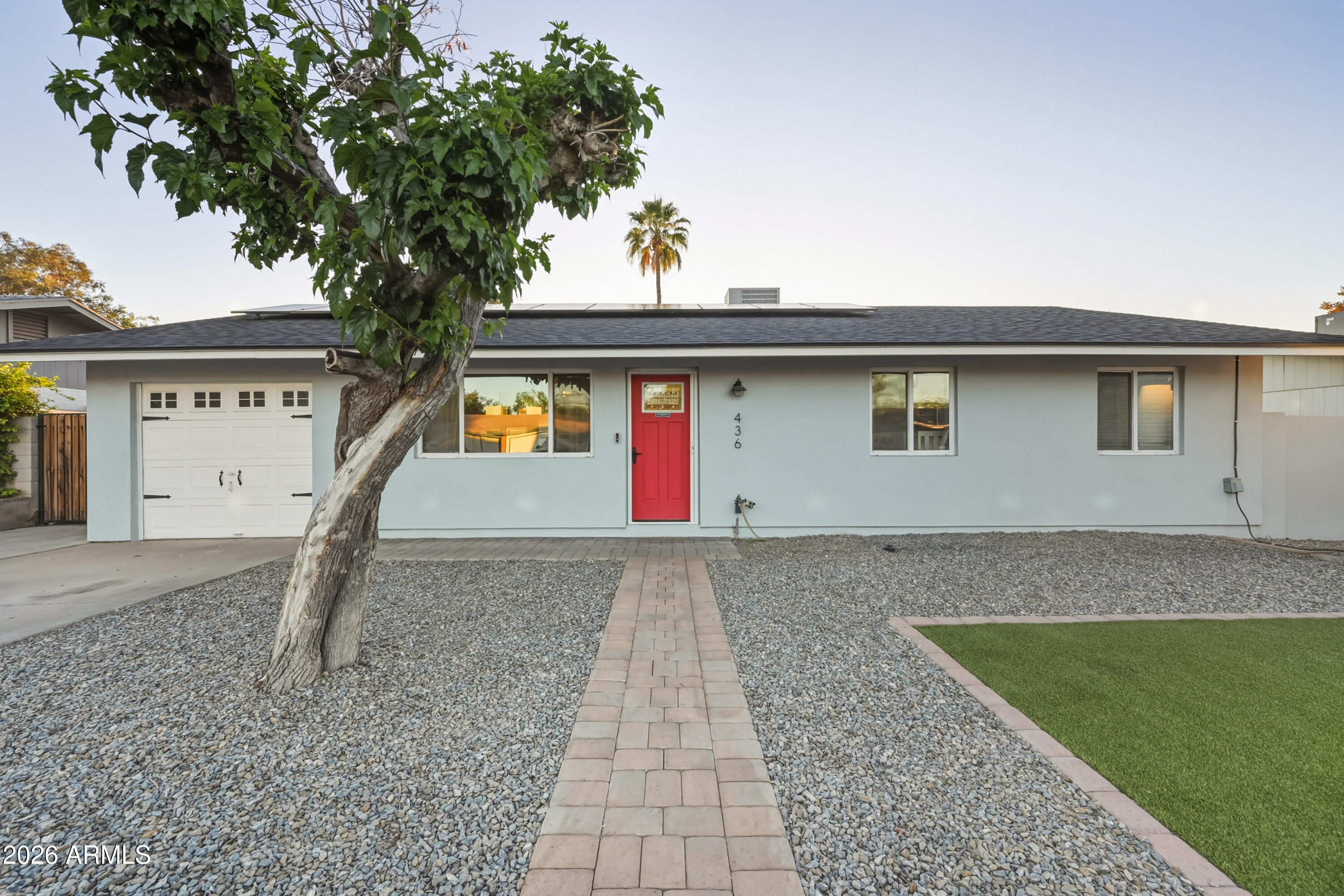 436 North Larkspur Street Gilbert, AZ 85234 - Photo 1 of 31 a front view of a house with a yard